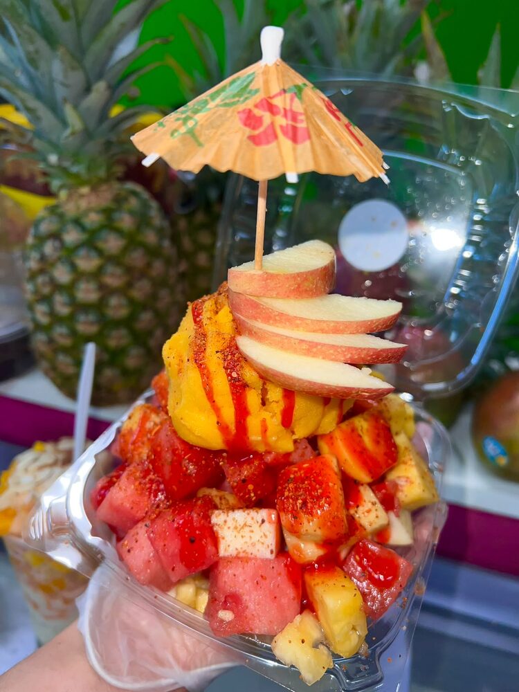 Crazy fruit cup loaded with mango nieve, chamoy and chili