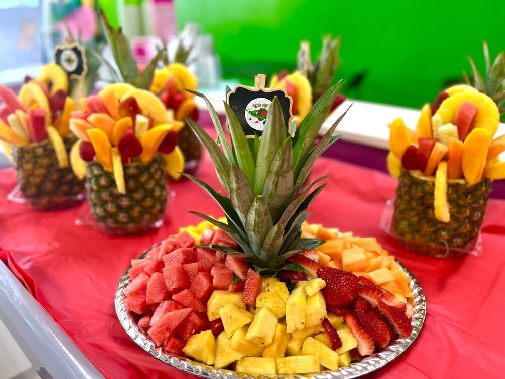 Party fruit tray with a carved pineapple centerpiece